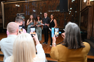 Family and friends taking photo's of the Veterinary Nursing Graduates at the Lantra Veterinary Nursing Graduation Ceremony 2024